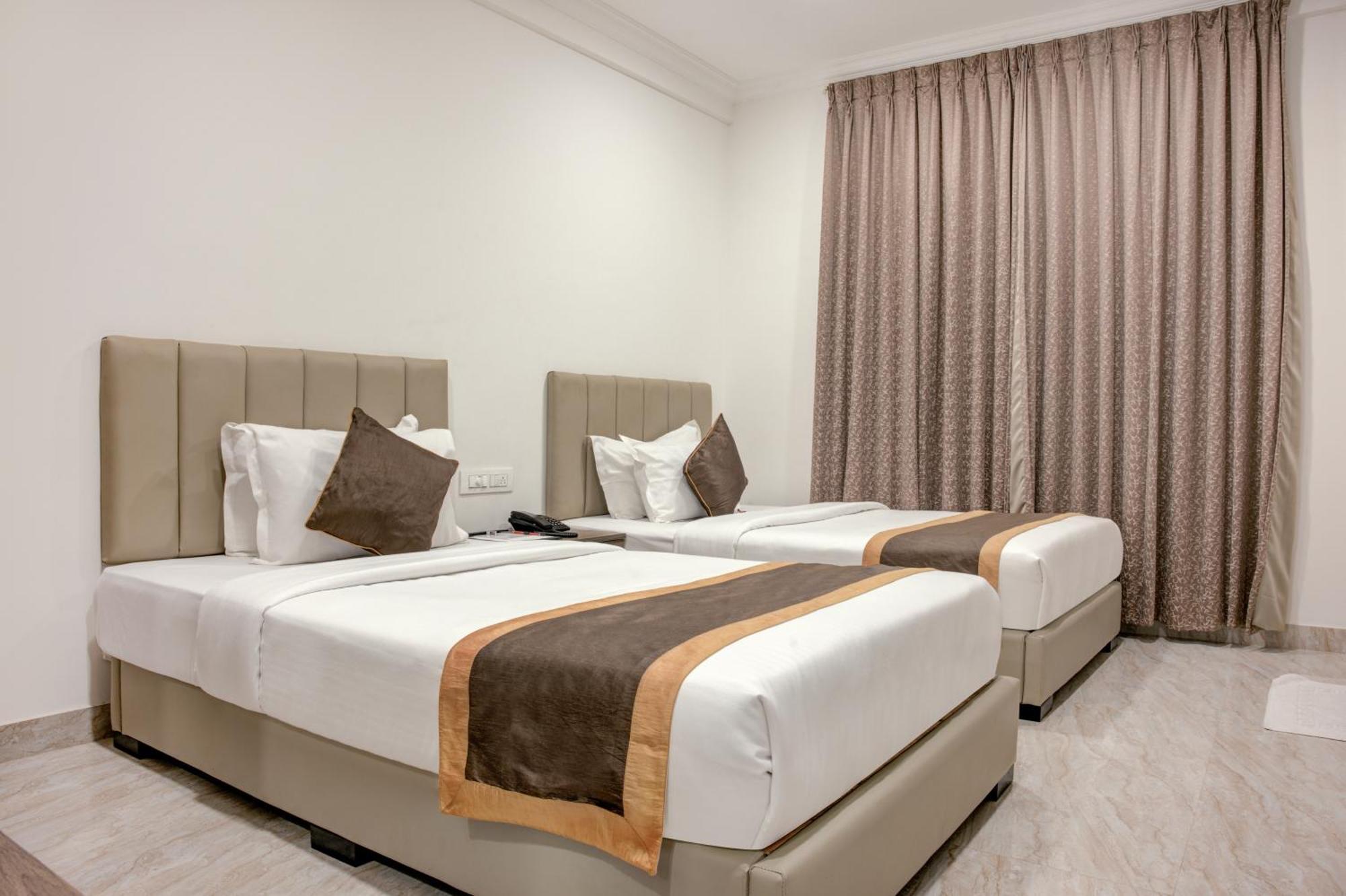 Hotel Sterling Inn Bangalore International Airport Yelahanka Экстерьер фото
